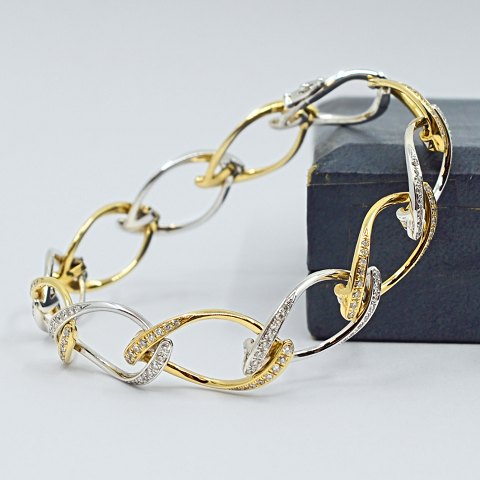 Klaus Rygaard; Diamond bracelet in 14k gold and white gold Klaus Rygaard; Diamond bracelet in 14k gold and white gold